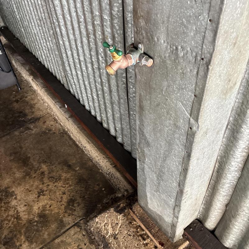Hose bib valve on corrugated metal wall installation Hose bib valve on corrugated metal wall installation
