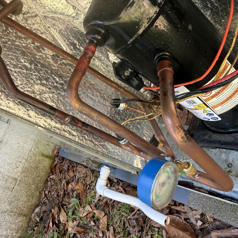 Refrigerant line and compressor on HVAC unit maintenance Refrigerant line and compressor on HVAC unit maintenance