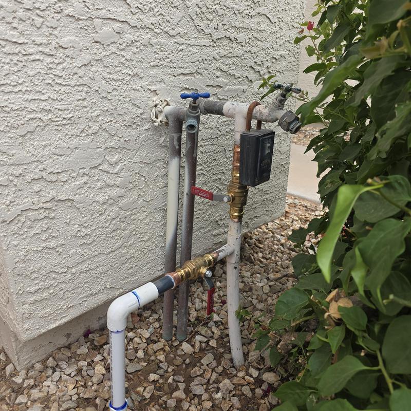 Ball valves on water service line outdoors