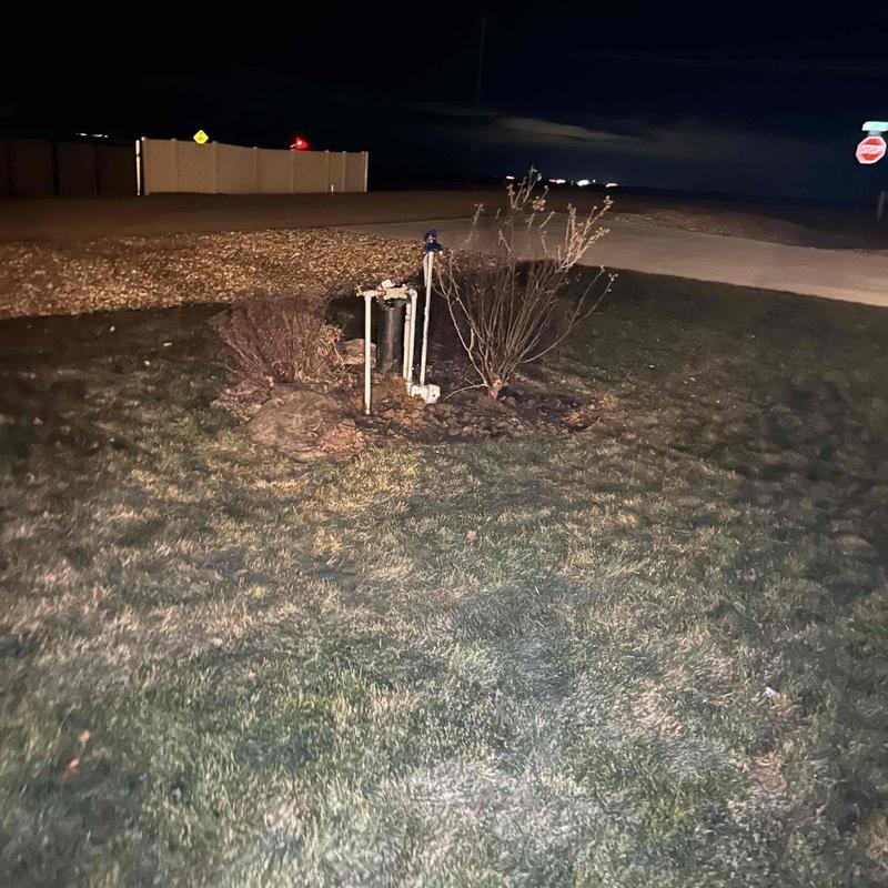 Yard hydrant and well head excavation at night