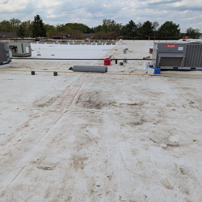 TPO single ply roof restoration on flat commercial roof