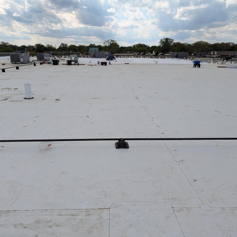 TPO single ply roof installation on commercial building