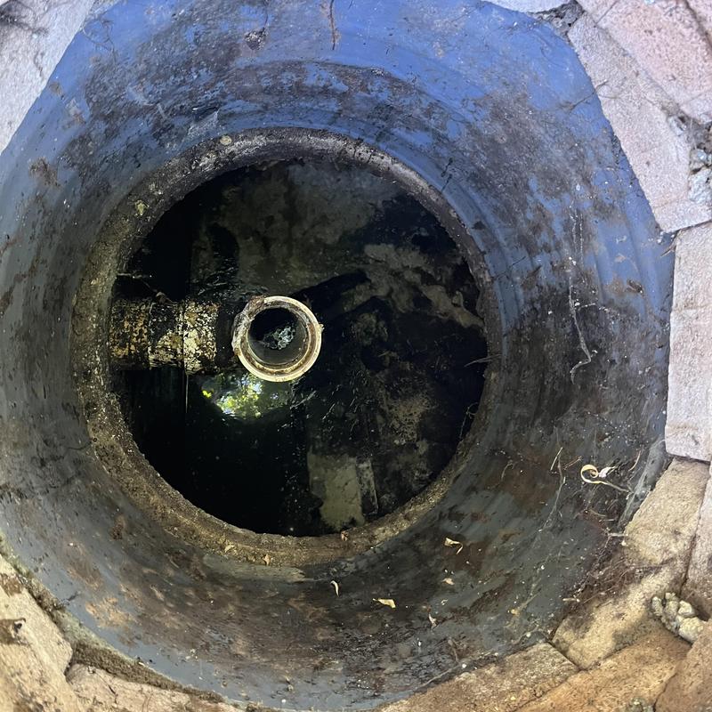 Septic tank inlet pipe with standing sewage water