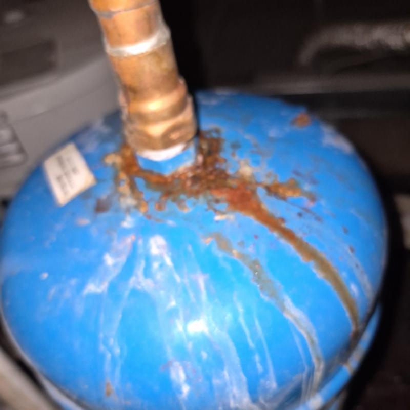 Thermal expansion tank with rust and corrosion buildup Thermal expansion tank with rust and corrosion buildup