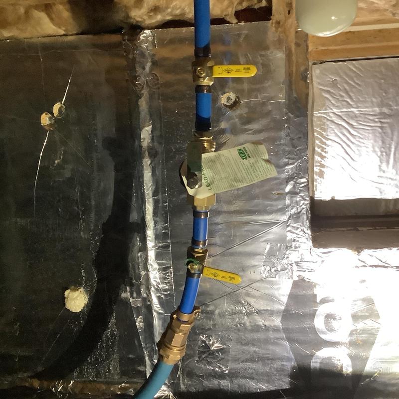 Pressure reducing valve with blue PEX piping installation Pressure reducing valve with blue PEX piping installation