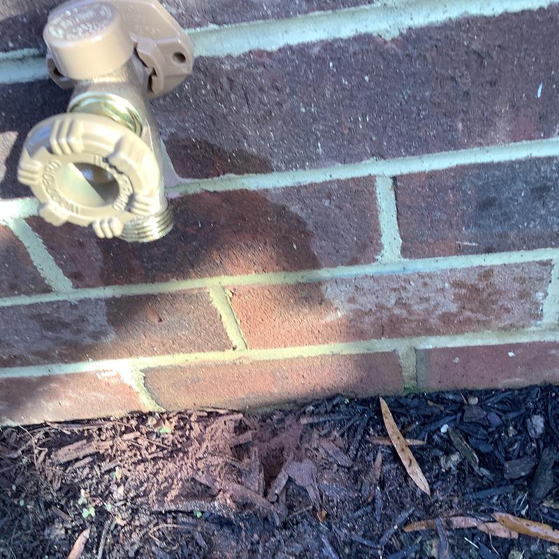 Outdoor hose bib installation on brick wall Outdoor hose bib installation on brick wall