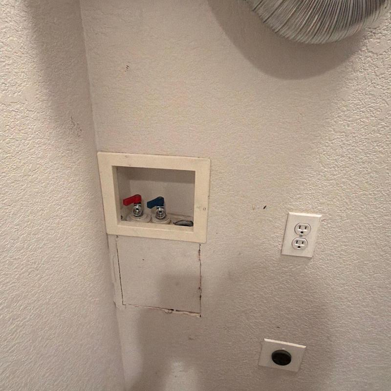 Laundry hot and cold water valves replacement area