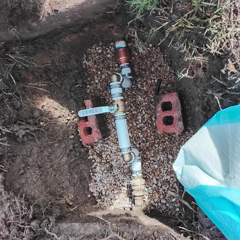 Water main pipe with personal shutoff valve and gravel