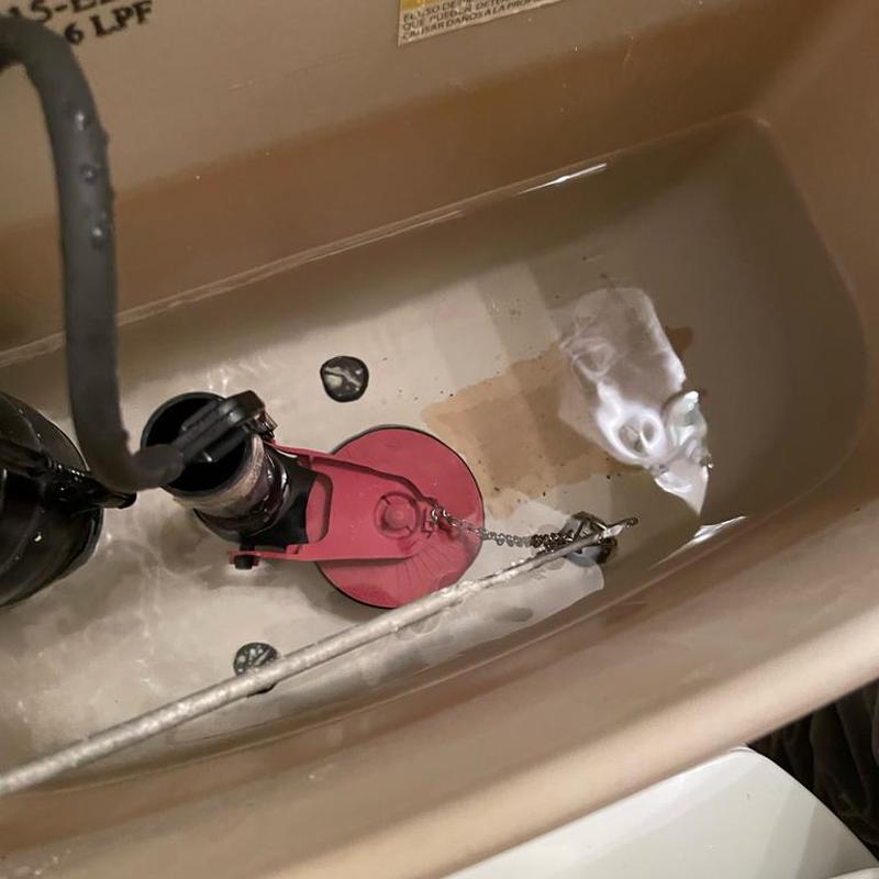 Toilet flapper and fill valve inside tank in Mesa, AZ