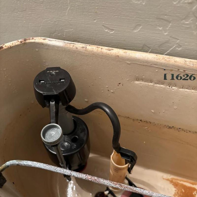 Toilet fill valve and flush valve inside tank