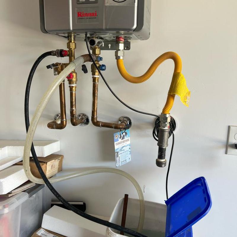 Tankless water heater flush setup with hoses