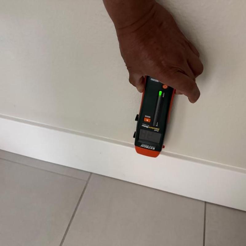 Extech moisture meter detecting drywall leak