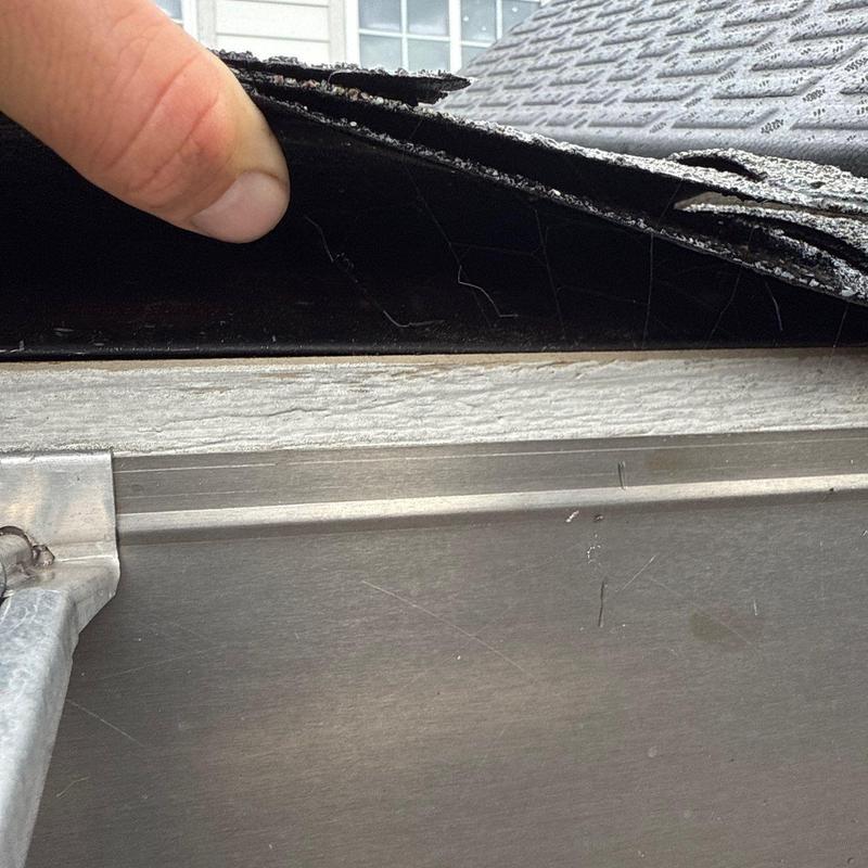 Roof shingles lifting with hail damage inspection in Murfreesboro