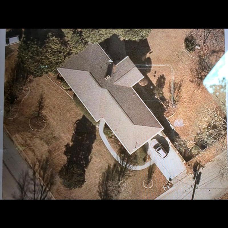 Asphalt shingle roof aerial inspection with driveway view Asphalt shingle roof aerial inspection with driveway view