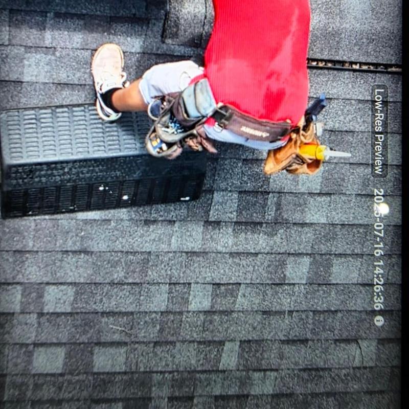Roof vent installation on shingled roof by roofer Roof vent installation on shingled roof by roofer
