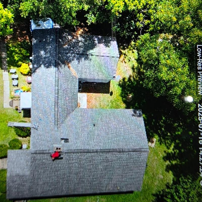 Chimney flashing and pipe boots on residential roof Chimney flashing and pipe boots on residential roof