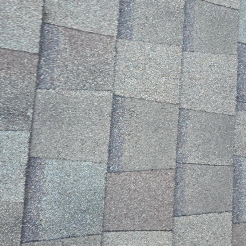Asphalt shingles with hail damage granule loss Asphalt shingles with hail damage granule loss