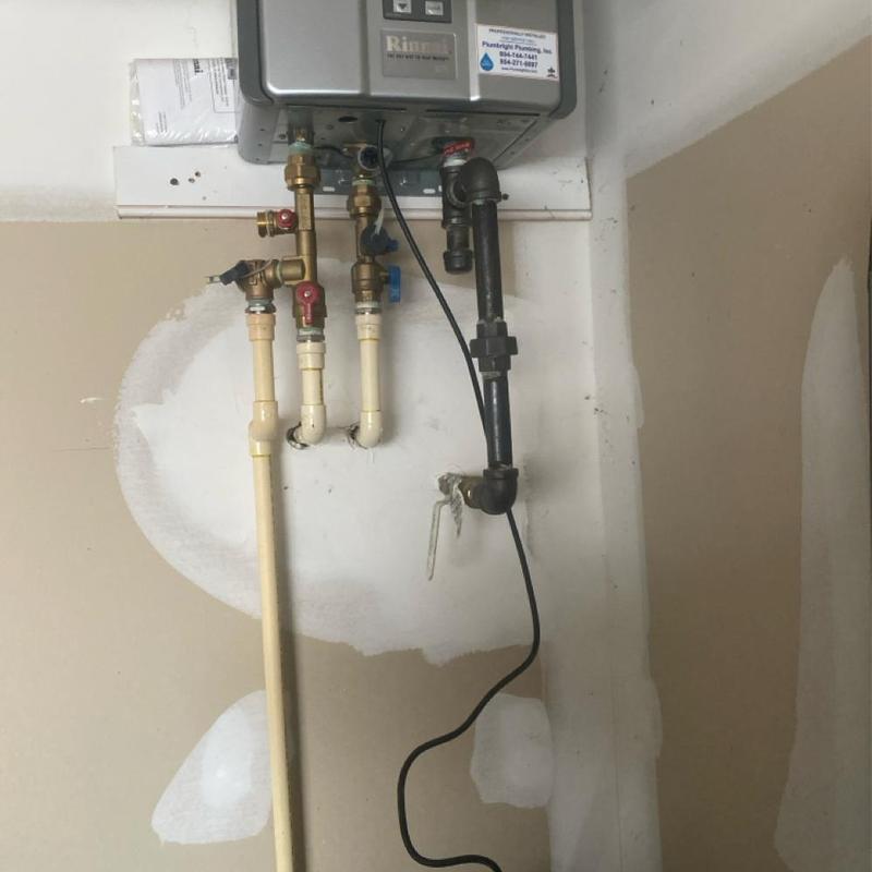 Rinnai natural gas tankless water heater and pipes Rinnai natural gas tankless water heater and pipes