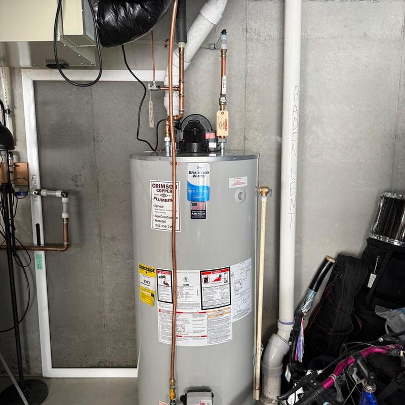 Water heater with copper plumbing in basement