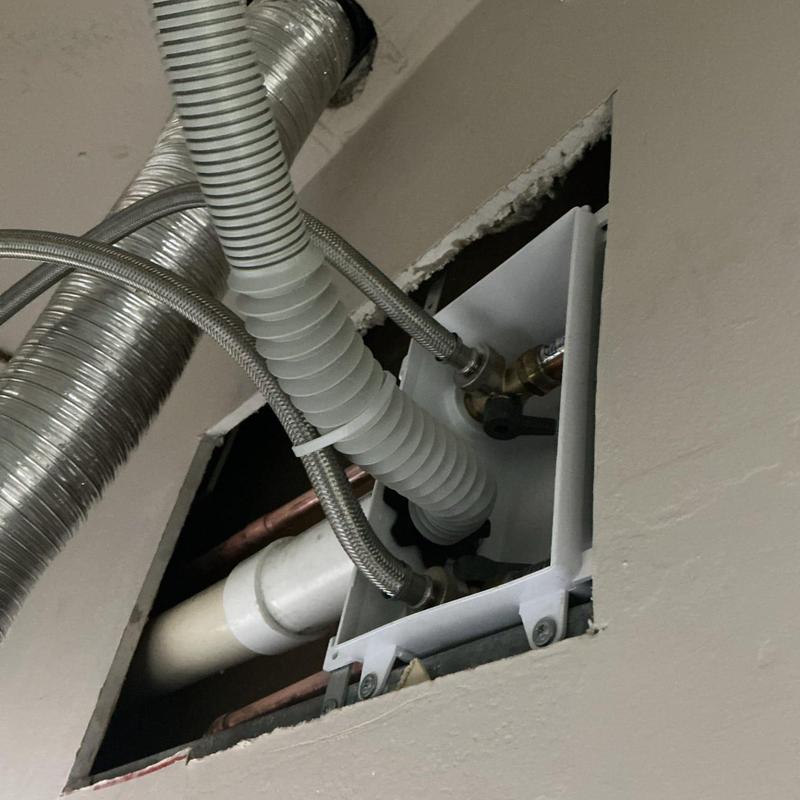 Washing machine box with valves and hammer arrestors