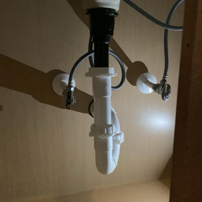Lavatory faucet drain pipe and shut off valves under sink Lavatory faucet drain pipe and shut off valves under sink