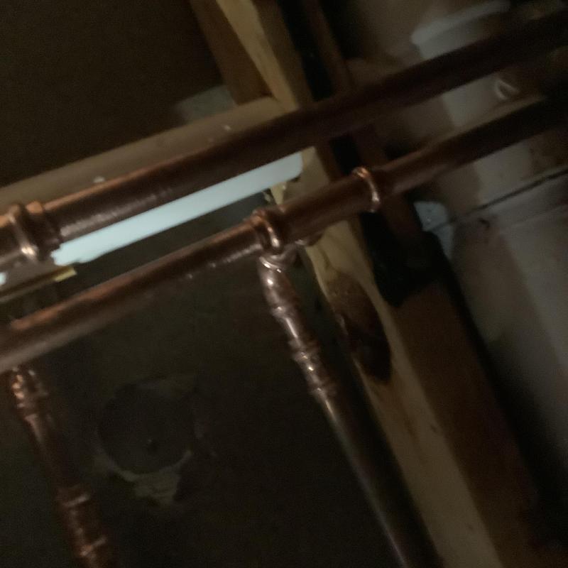 Copper water line plumbing with joint connections in ceiling cavity Copper water line plumbing with joint connections in ceiling cavity