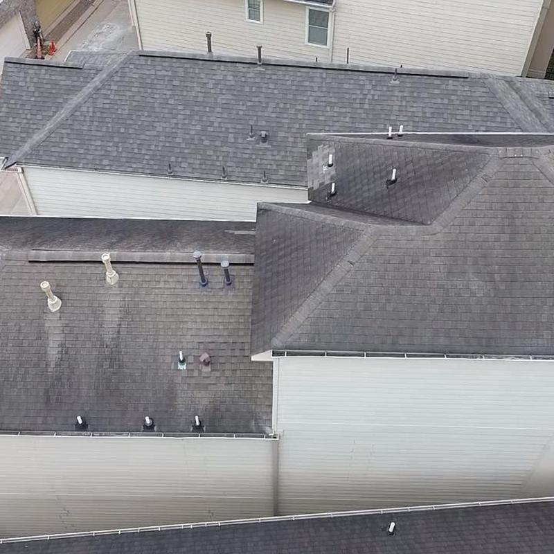 Asphalt shingle roof inspection on multi-story home