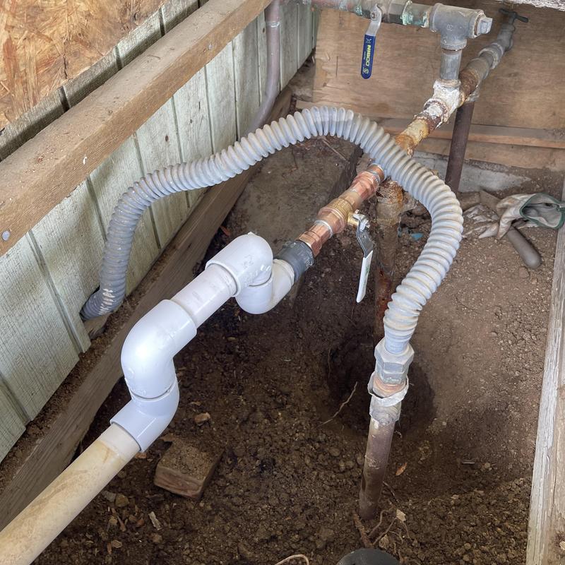 PEX water line with PVC elbow and copper fittings