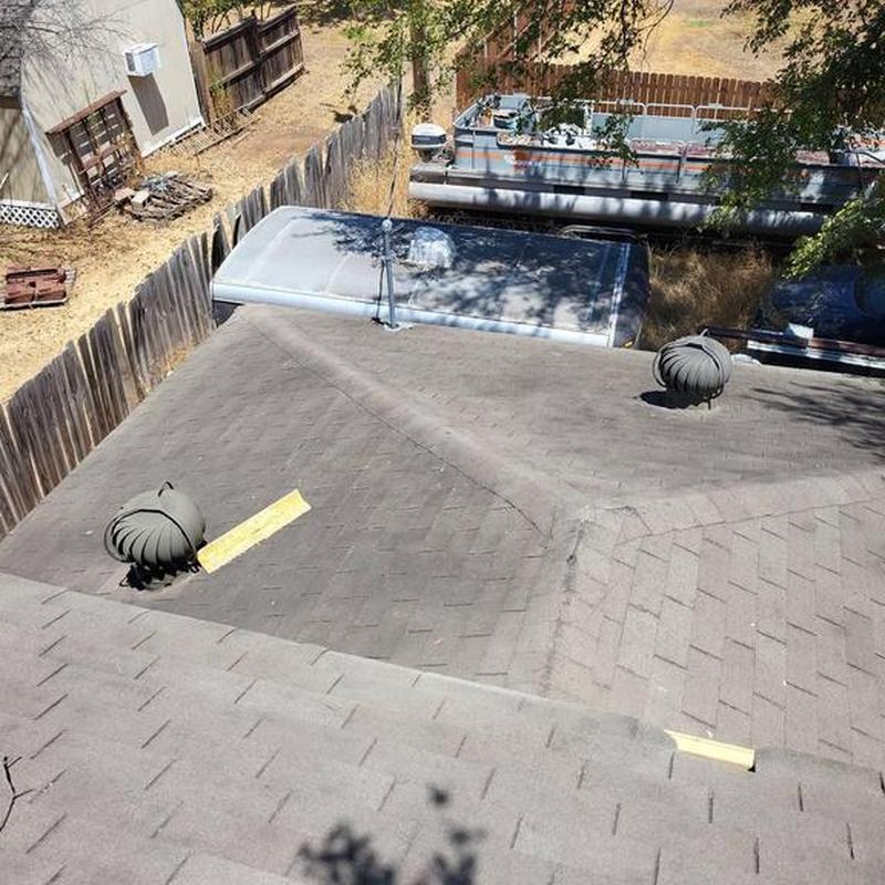 Roof shingles and turbine vents inspection on residential roof