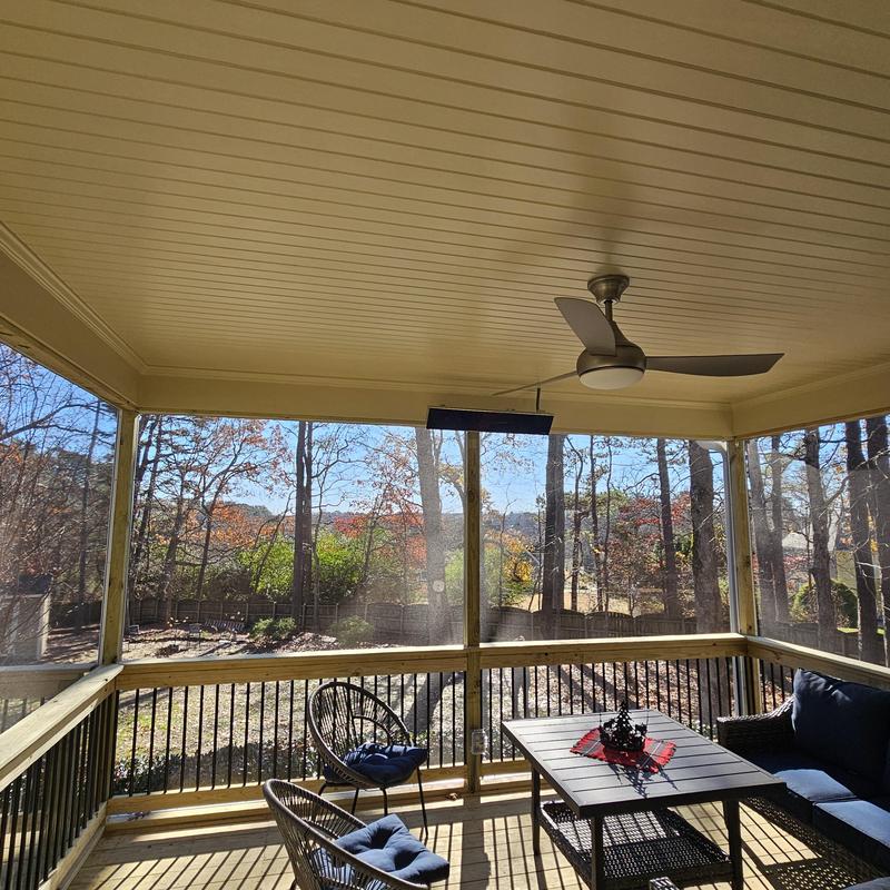 Screened deck with ceiling fan and outdoor seating