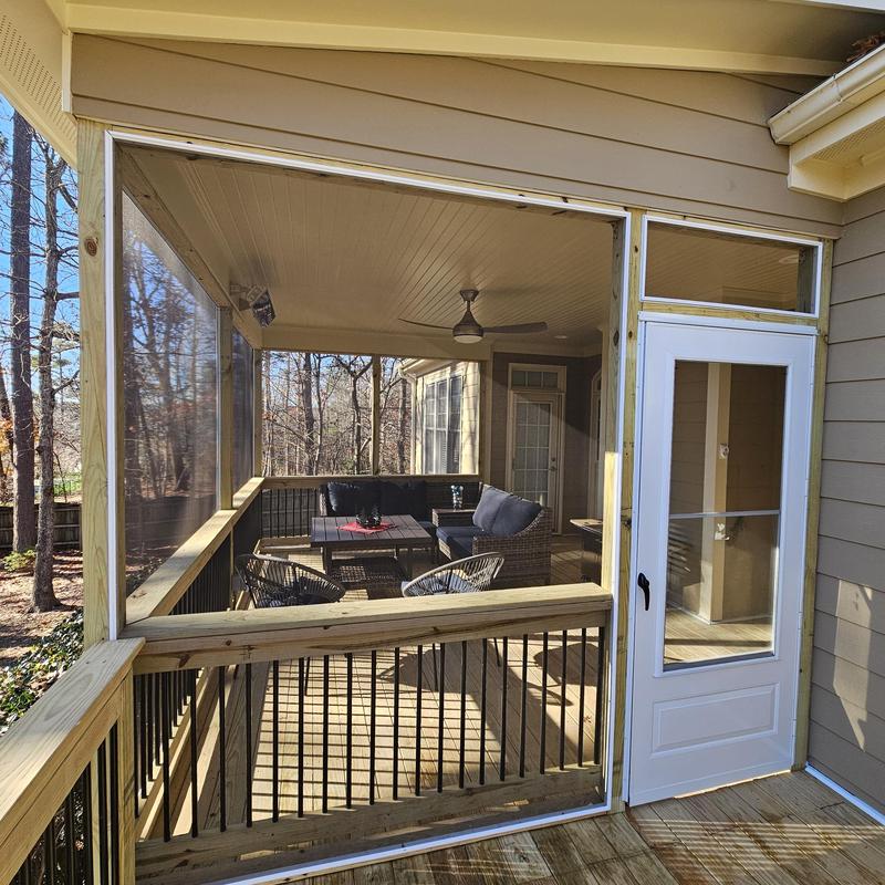Screened porch enclosure on deck with seating area