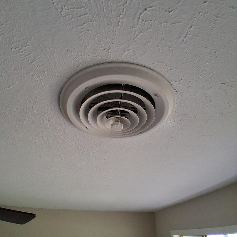 Ceiling AC register vent installed in room ceiling