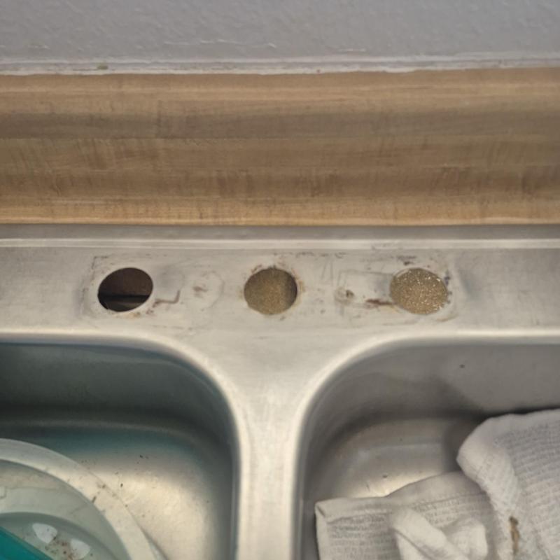 Kitchen sink faucet mounting holes before installation Kitchen sink faucet mounting holes before installation