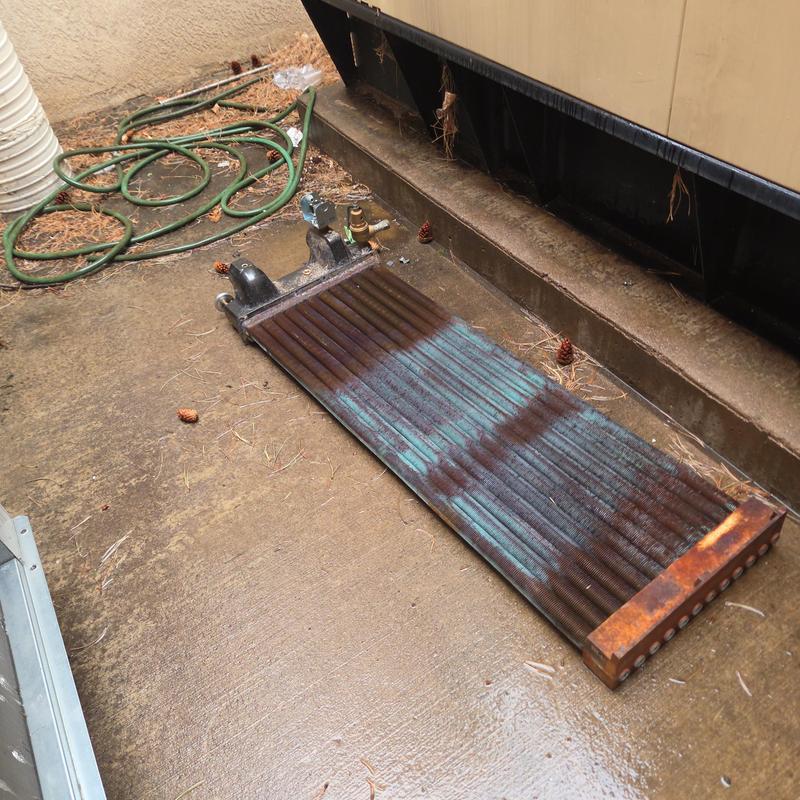 Heat exchanger coil removed from central plant unit