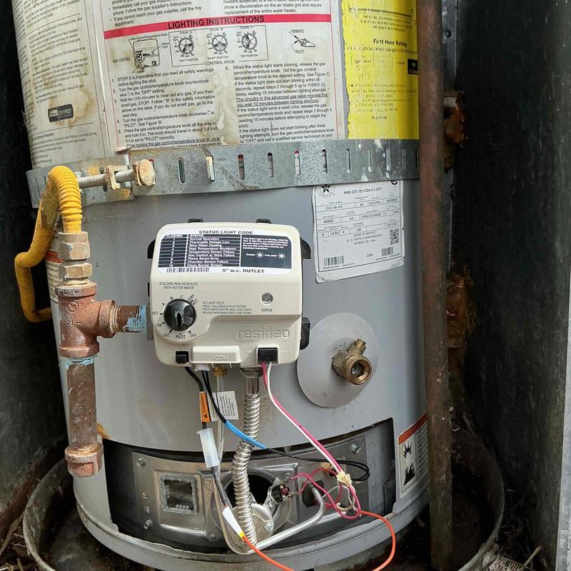 Gas water heater burner assembly and gas control installation