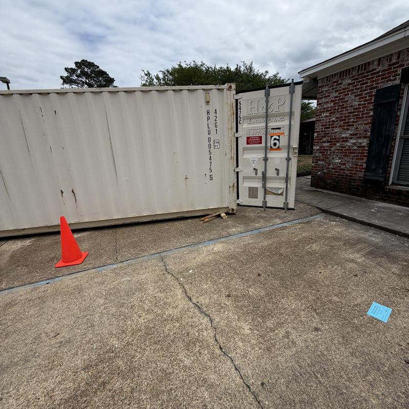 Storage container box placed outside building for remodel