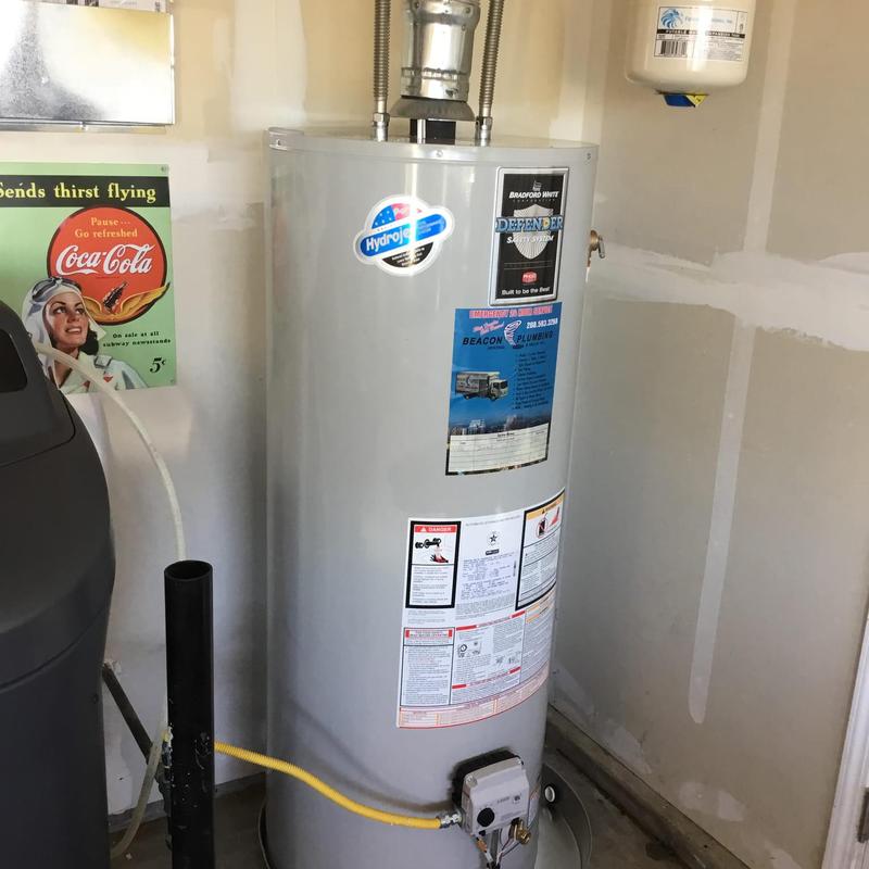Natural gas water heater with expansion tank installed