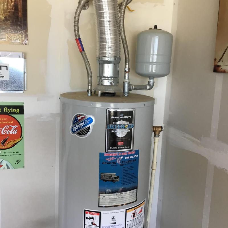 Natural gas water heater with expansion tank installed
