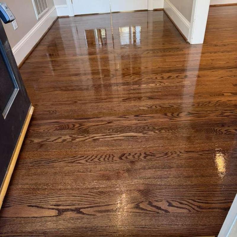 Hardwood floor with glossy finish in hallway
