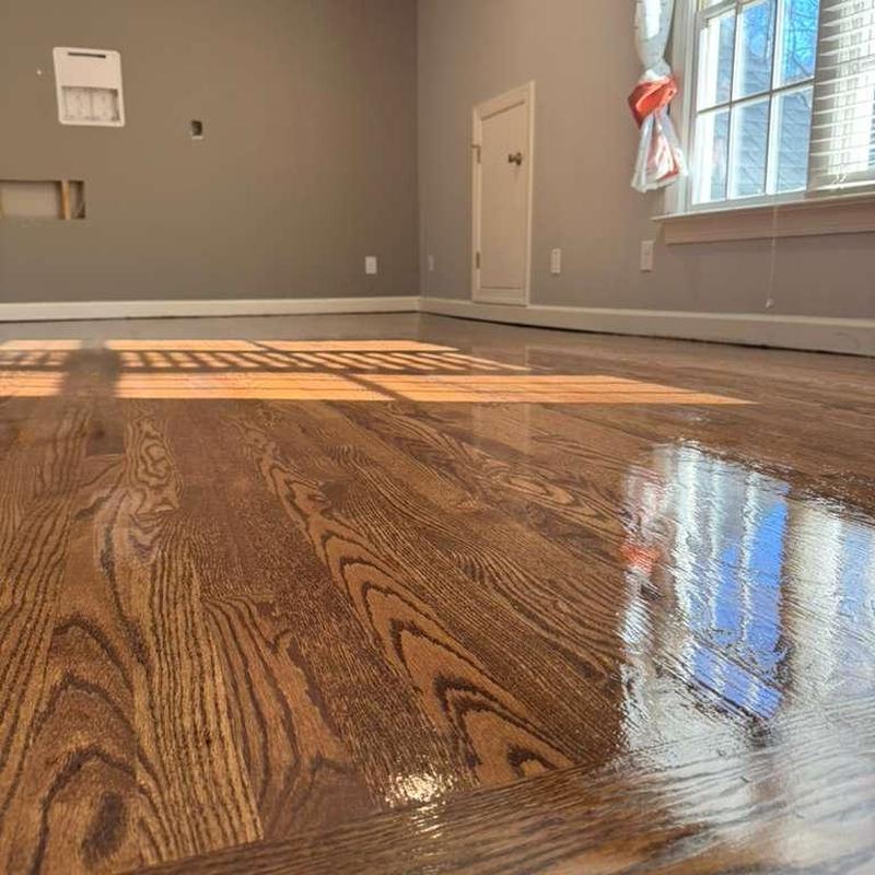 Hardwood floor with glossy finish in empty room