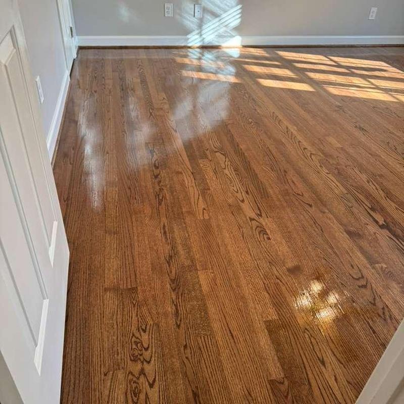 Hardwood floor with glossy finish in empty room
