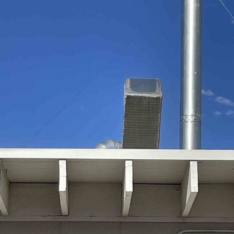 Commercial gas water heater vent and exhaust installation