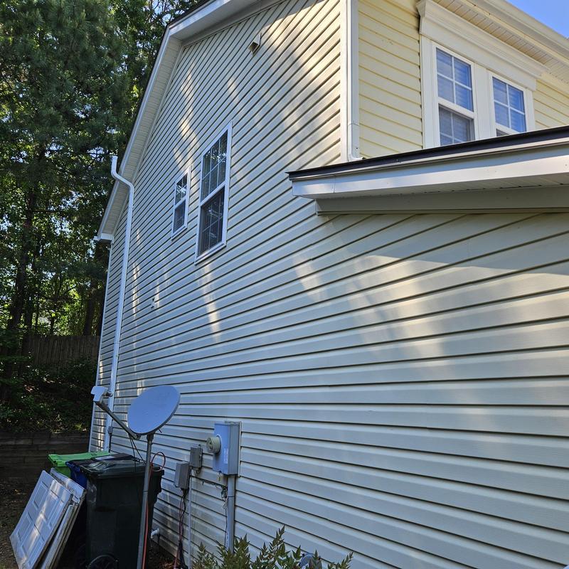 Vinyl siding installation on residential home exterior