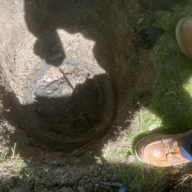 Septic tank opening with pump-out work in progress