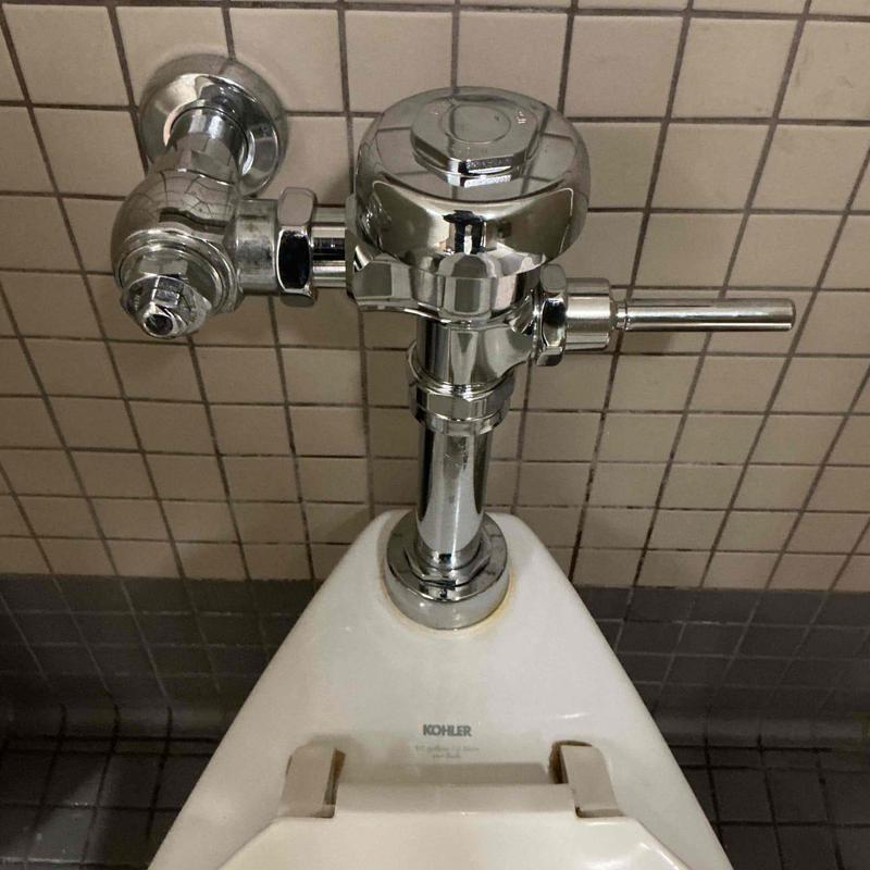 Sloan flush valve installation on commercial urinal