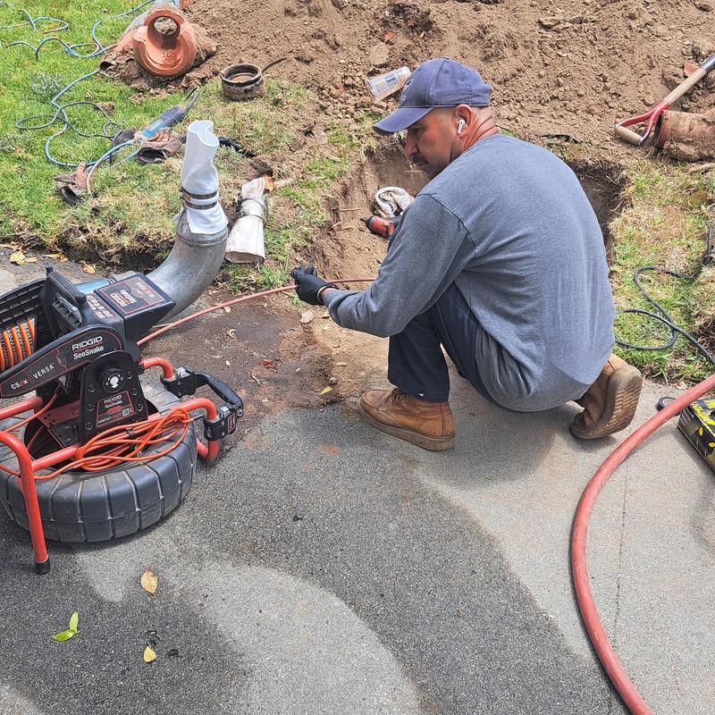 Clay lateral sewer pipe with inspection camera setup