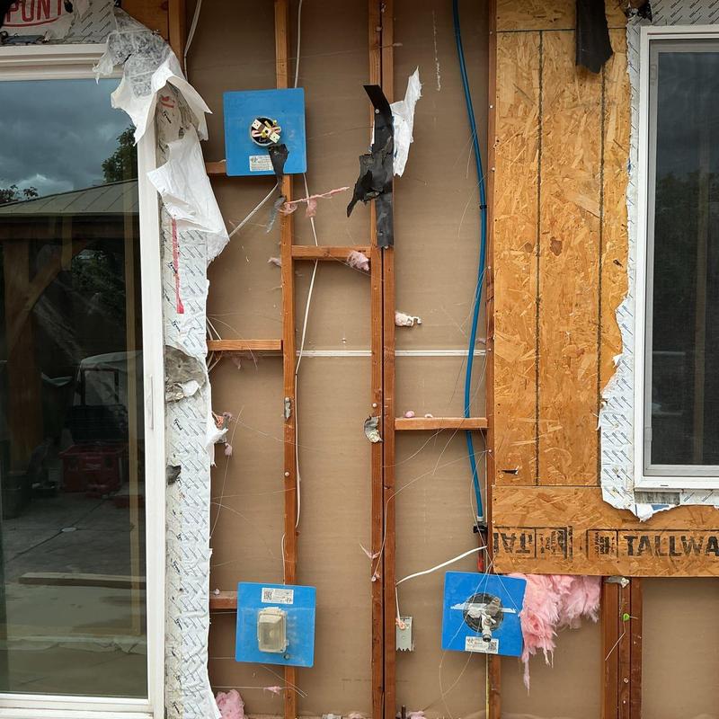 PEX plumbing tied to kitchen sink and backyard hose bib