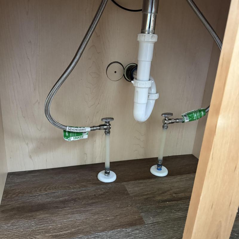 Lavatory sink plumbing connections with supply valves installed