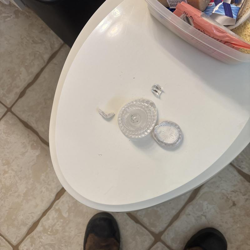 Toilet flush handle knob broken pieces on lid Toilet flush handle knob broken pieces on lid