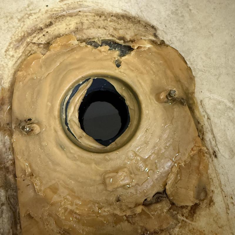 Toilet flange with deteriorated wax ring seal Toilet flange with deteriorated wax ring seal